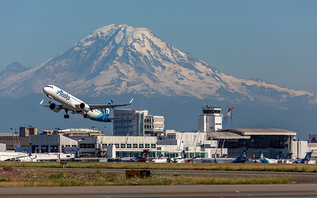 Alaska Airlines departs Sea-Tac, 25 July 2019.